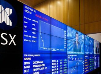 ASX outage stops trade in dozens of shares, market slides on Metcash, AUB and CSL